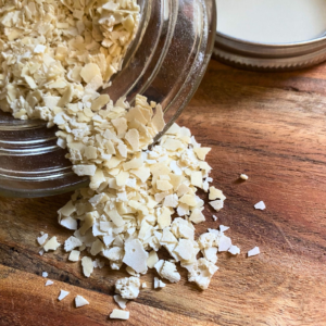 Dehydrated sourdough starter spilling out of a jar.