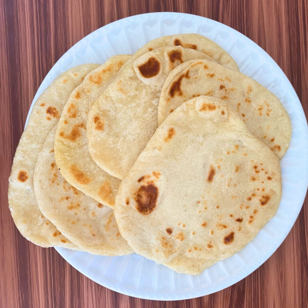 Sourdough tortillas on a white plate